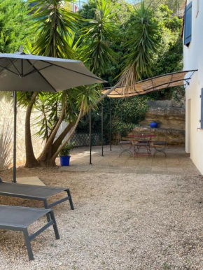 Appart. bas de villa de 50m2 avec parking privatif